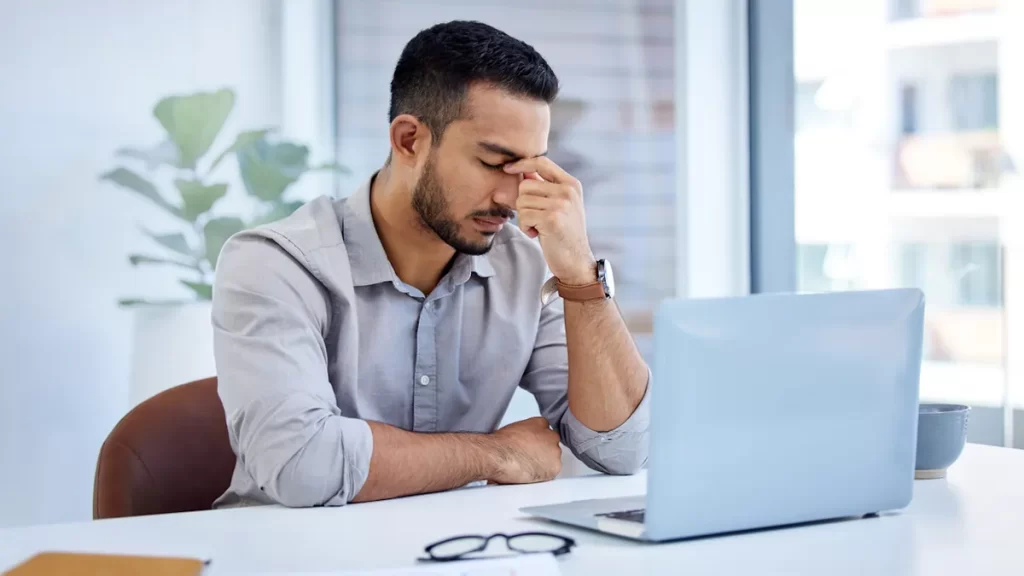 man stressed at work